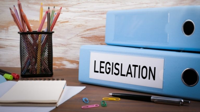 Procurement, Office Binder on Wooden Desk